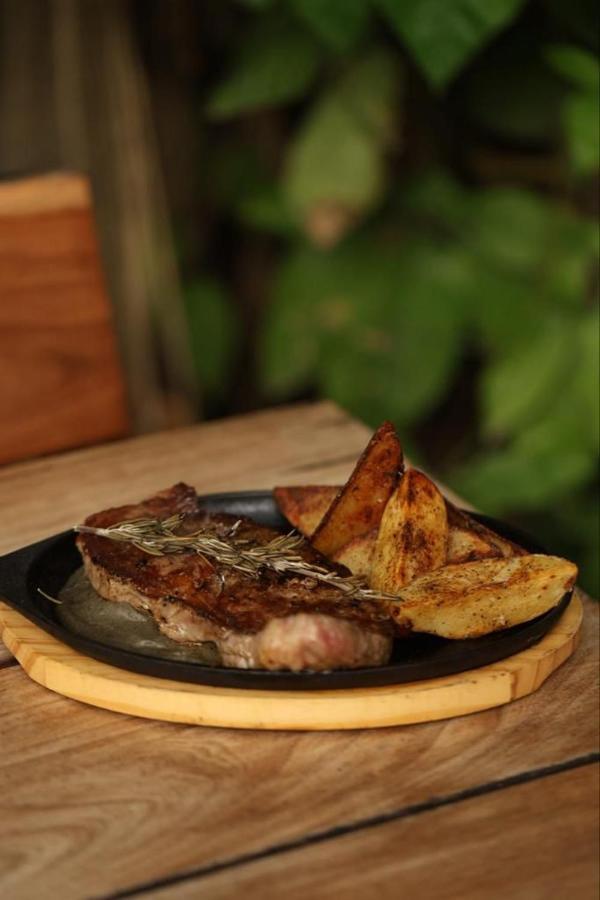 Mio Tulum Hotel Boutique Exterior photo A steak with potato